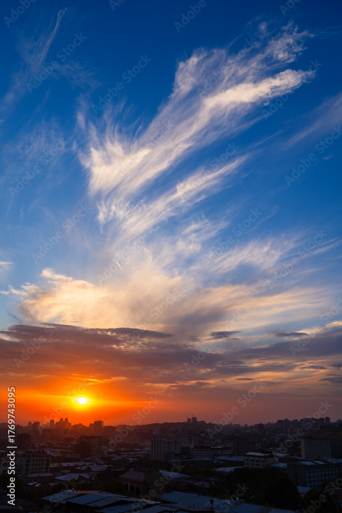 Naklejka premium Fabulous sunset with beautiful clouds over Yerevan