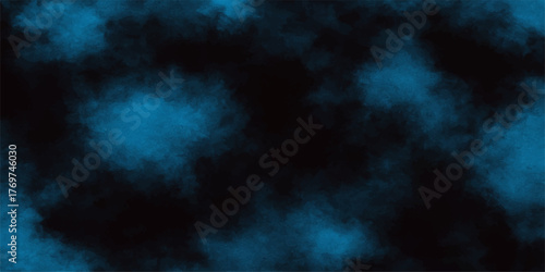 Abstract smoke texture against a dark blue night sky cloudscape with an explosion of light