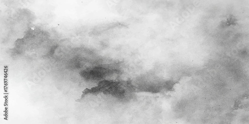The abstract, dark, and cloudy old paper texture holds a stormy grunge background with clouds and light mist