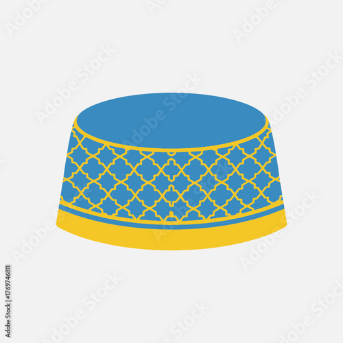 Blue and yellow patterned kufi hat on a white background.