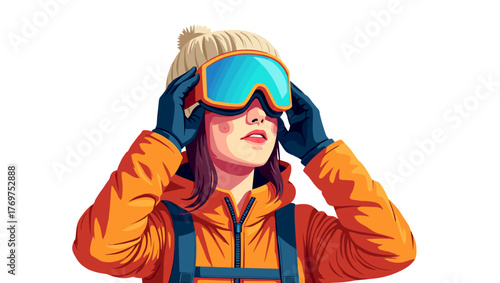 Young woman skier putting on goggles in orange jacket and wool hat against plain background, concept of stylish winter recreation