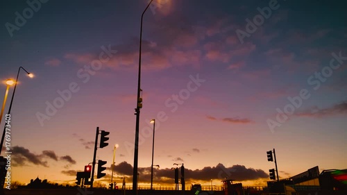 Urban Sunset Over City Street, Streetlights, Traffic Lights Silhouetted, Colourful Sky, Holland Park Avenue, A3220 Road, London, UK