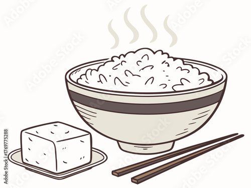 Rice bowl with steaming white rice and tofu served on plate with chopsticks. Rice bowl includes fluffy grains and tofu cube on side, creating a delightful meal concept for Asian cuisine.