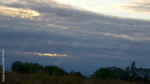 Timelapse of clouds over a field
