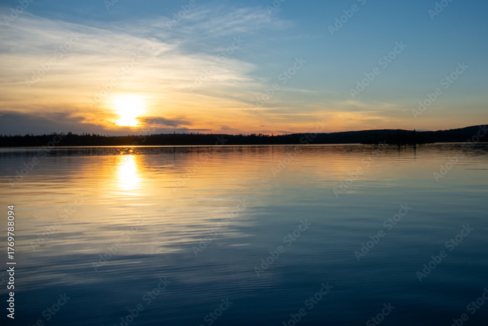 Fototapeta premium Sunsetting on Granite Hill Lake Ontario Canada