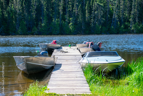 Boats down at the dock on Granite Hill Lake Ontario Canada