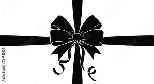Elegant black ribbon bow on a white background, symbolizing mourning or a special occasion