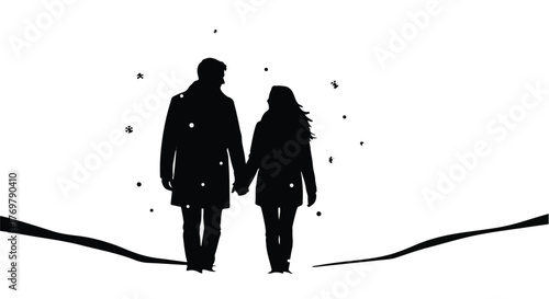 Silhouetted couple holding hands and walking together in a snowy winter landscape with falling flakes.