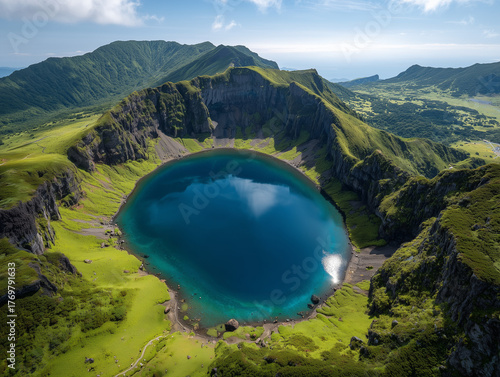 Okama crater lake reflecting blue sky in zao mountains, japan