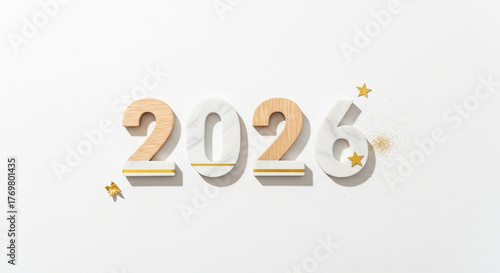 Celebrate the future with elegant 2026 numbers, sparkling gold stars, and festive confetti for a bright new year ahead.