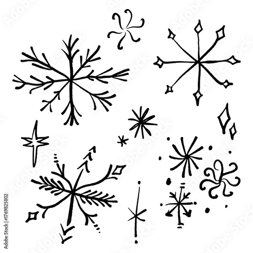 Set of New Year brush stroke or chalk ornate texture snowflakes icons, Christmas patterned black brush hand-drawn isolated elements on white background. Scandinavian Norwegian simple winter print