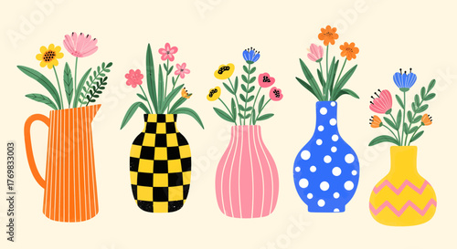 A vibrant collection of five uniquely patterned vases, each holding a beautiful bouquet of colorful flowers.