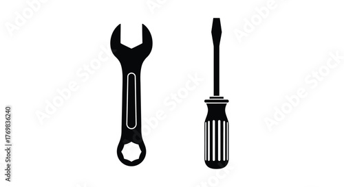 Simple black and white illustration showing a wrench and a flathead screwdriver