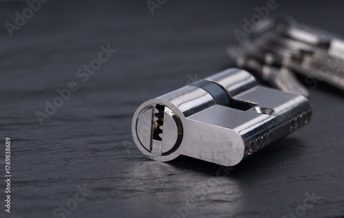 Keys and lock cylinder for door lock. Pin tumbler components ready to replace or repair