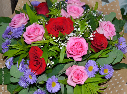 beautiful bouquet of red roses. rose queen of flowers. congratulations on the holiday. gift to your beloved woman. declaration of love, feelings or sympathy