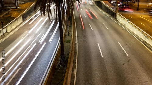 vehicles on a highway in barcelona at night