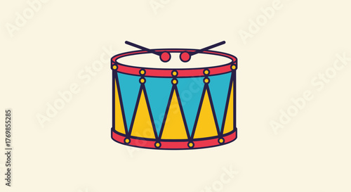 Colorful drum with drumsticks sits on beige surface, creating a playful and musical atmosphere for children's entertainment.