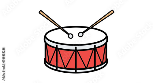 Red drum with drumsticks sits ready to be played, representing music and rhythm, inviting creativity and artistic expression.