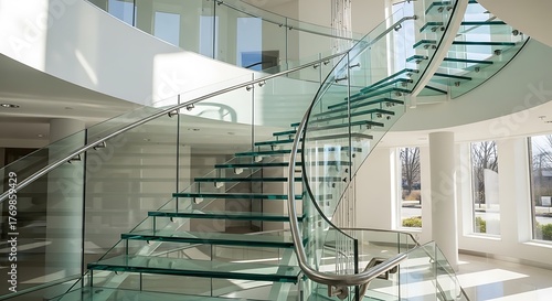 Floating glass staircase within a contemporary bright building design