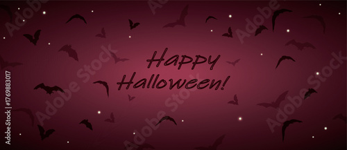 Happy Halloween banner with flock of flying bats in nightsky