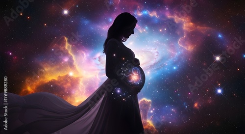 Silhouette of a pregnant woman with a galaxy inside her belly in space