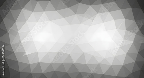 Abstract geometric pattern with triangles and shades of gray creating a modern design.