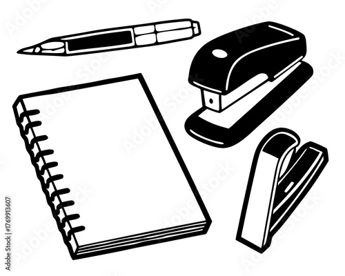 Office supplies including a notebook, pen, stapler, and staple remover