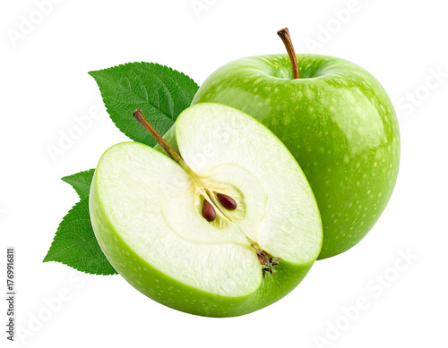 Two green apples, one whole, one cut open to reveal seeds, with leaves, isolated on a black background