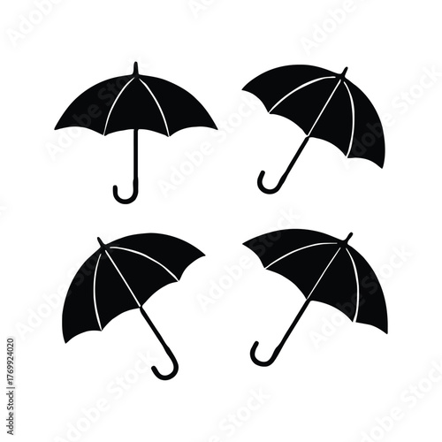 Four black umbrellas on a white background, representing protection and shelter