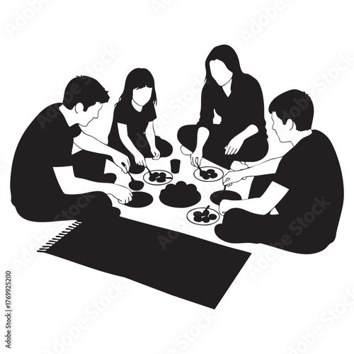 Family Eating Together on Floor - Traditional Meal and Bonding Time