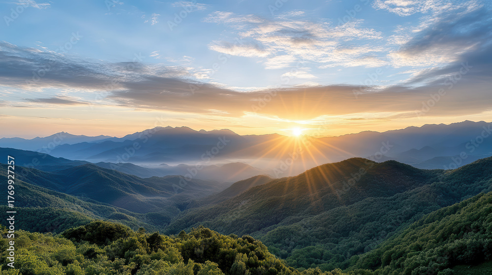 Obraz premium Breathtaking mountain landscape dawn with sun rising over peaks, illuminating valleys and hills