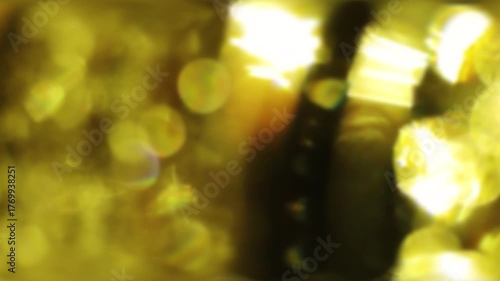 Holiday Gold Sparkle Christmas Light Overlay with Shiny Glitter Motion.