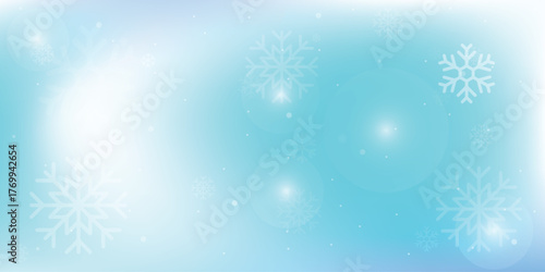 Natural Winter Christmas background with blue sky, heavy snowfall, snowflakes in different shapes and forms, snowdrifts. Winter landscape with falling Christmas shining