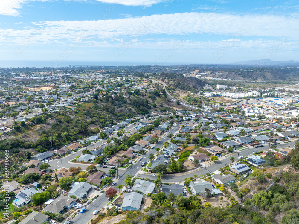 Fototapeta premium Aerial view of middle class houses in the valley of Oceanside town in San Diego, California. USA.