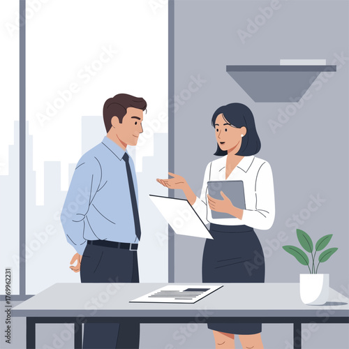 Business colleagues discussing documents at office desk during meeting.