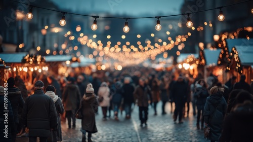 A cozy outdoor Christmas market illuminated with warm lights during the festive season.