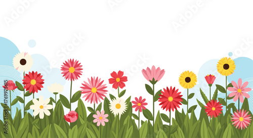 Vibrant field of spring flowers with lush green grass and a clear blue sky, illustrating a joyful and fresh natural landscape.