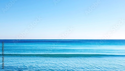 Fototapeta Naklejka Na Ścianę i Meble -  Minimalist Seascape with Blue Gradient Ocean and Clear Sky at Daytime Scenery Marine Theme Tranquil Ocean Water Horizon Calm Waves Azure Serene