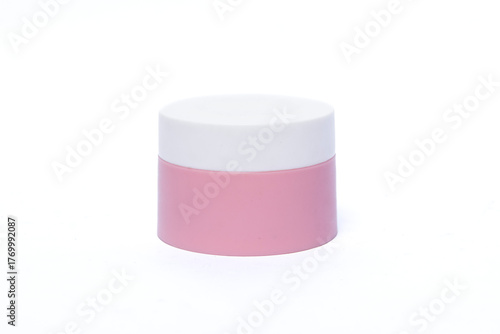 Small Pink Cosmetic Jar with White Lid on White Background