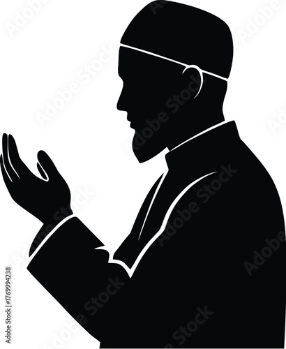 Silhouette of a man in prayer, wearing a cap, with hands raised in supplication.