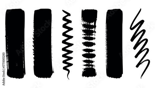 Collection of black brush stroke elements and scribbles