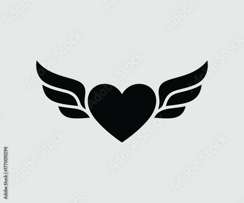 Vector heart with outstretched wings on gray background