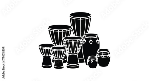 A collection of various african percussion drums arranged together in a striking black silhouette against a white background