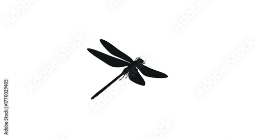 A striking black silhouette of a dragonfly with delicate wings spread wide against a clean white background