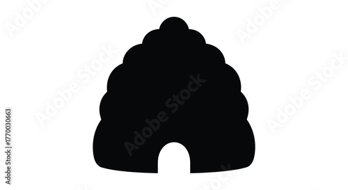 A stark black silhouette of a traditional beehive with a rounded top and arched entrance against a clean white background