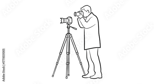 A photographer in silhouette using a tripod and camera to capture an image in a simple outline drawing silhouette