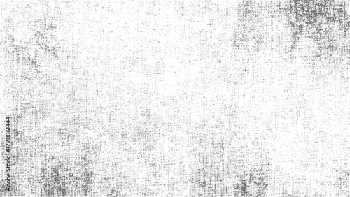 textured background with pattern of gray dots and lines on white surface.