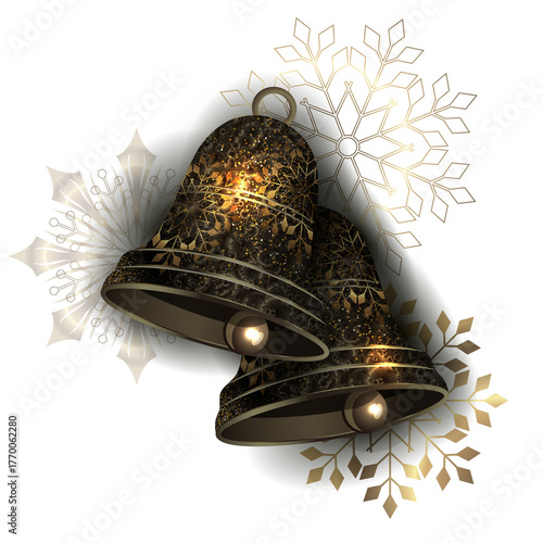 Merry Christmas. Isolated golden bells with exquisite snowflakes.
