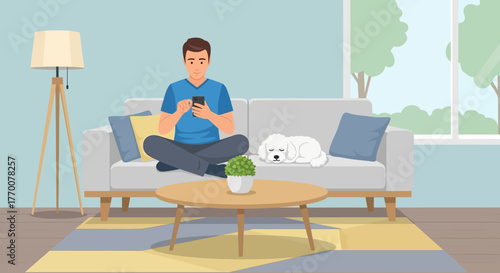 Man using phone with his dog resting on the couch creates peaceful home scene