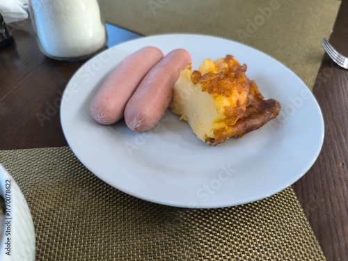 morning breakfast with boiled sausages and omelette. healthy eating concept